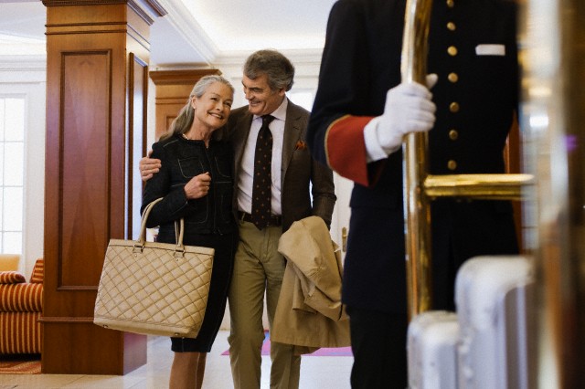 Couple entering hotel